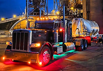 Tractor Trailer Lit Up At Night